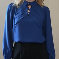 Blouse élégante bleue boutons strass Blouse élégante bleue boutons strass